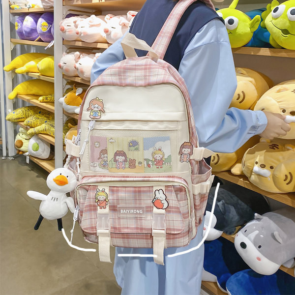 Tekstiilist värvilise mustriga seljakott ja võtmehoidja