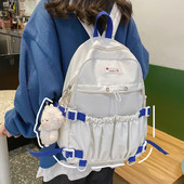 Naiste tekstiilist seljakott esitasku ja lukuga