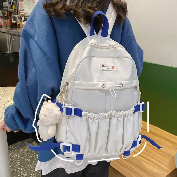 Naiste tekstiilist seljakott esitasku ja lukuga