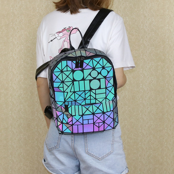 helkurefektiga naiste tekstiilist seljakott