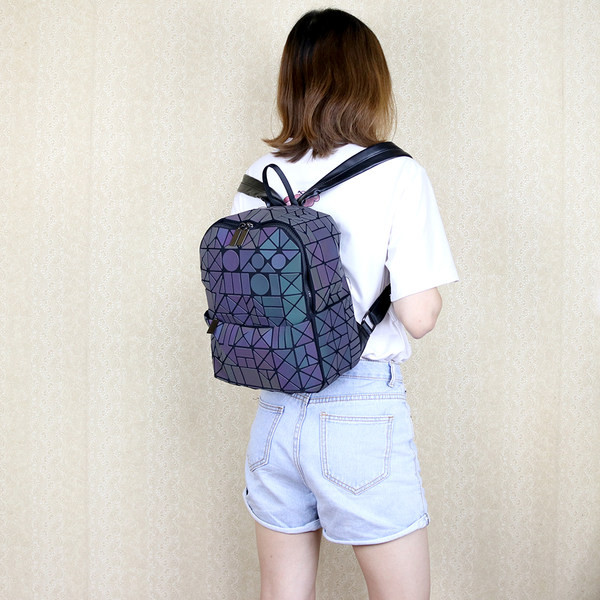 helkurefektiga naiste tekstiilist seljakott