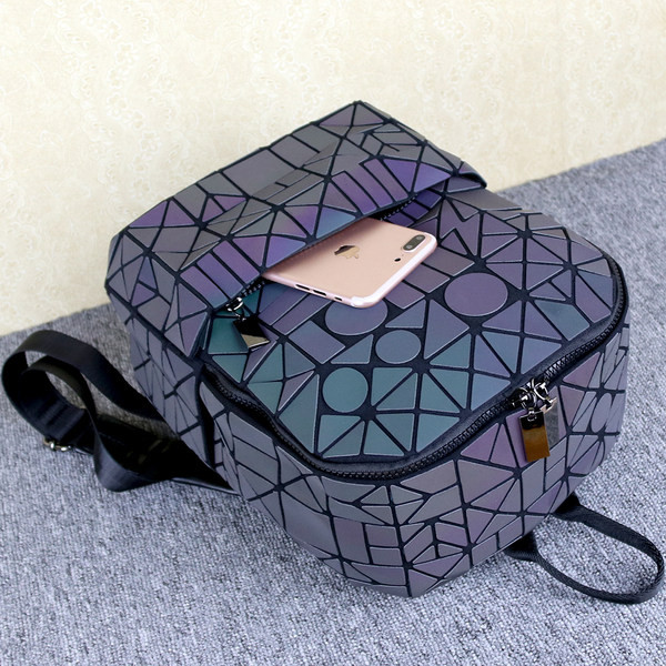 helkurefektiga naiste tekstiilist seljakott