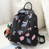 Mustrilise mustriga kangast funktsionaalne seljakott