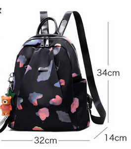 Mustrilise mustriga kangast funktsionaalne seljakott