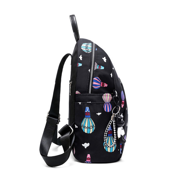 Mustrilise mustriga kangast funktsionaalne seljakott