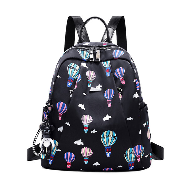 Mustrilise mustriga kangast funktsionaalne seljakott