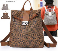 Naiste seljakott trükise ja metallist kinnitusega