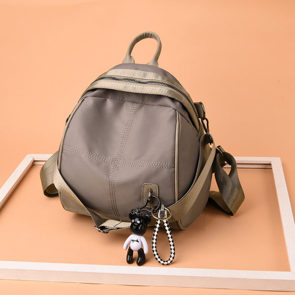 Naiste seljakott ripatsiga - kolme värvi