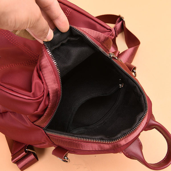 Naiste seljakott ripatsiga - kolme värvi