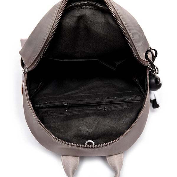 Moteriška kuprinė su kišenėmis ir tekstilinėmis rankenomis