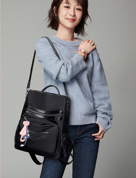 Nahkkott aplikatsiooni ja eesmise lukuga - kolme värvi