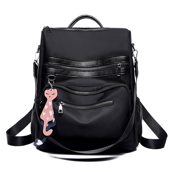 Nahkkott aplikatsiooni ja eesmise lukuga - kolme värvi