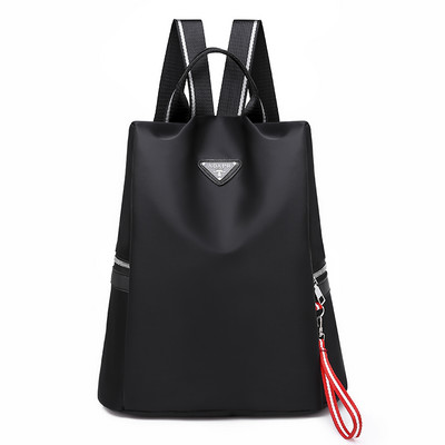 Naiste tekstiilist seljakott mitmes värvitoonis embleemiga