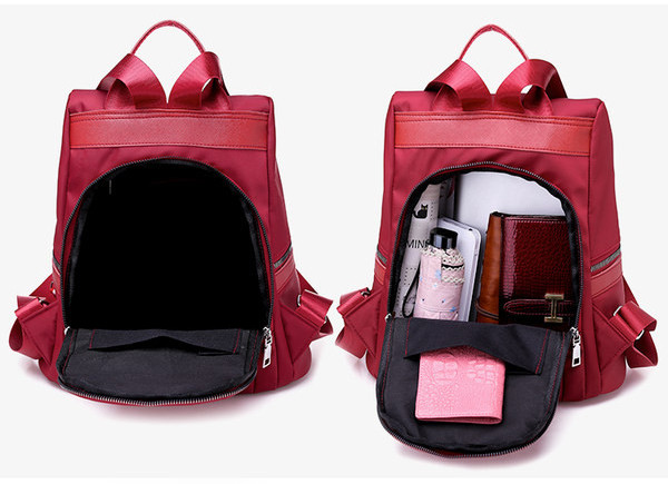 Naiste tekstiilist seljakott mitmes värvitoonis embleemiga