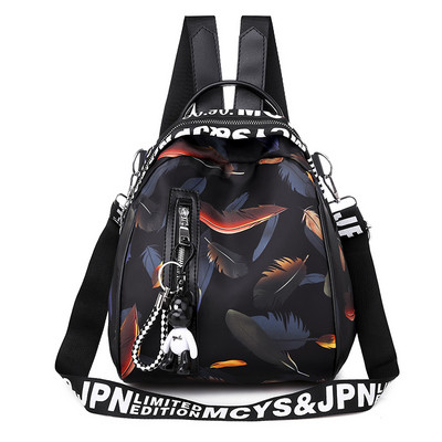 Naiste igapäevane seljakott eesmise luku ja ripatsiga