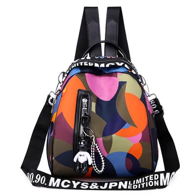 Naiste igapäevane seljakott eesmise luku ja ripatsiga