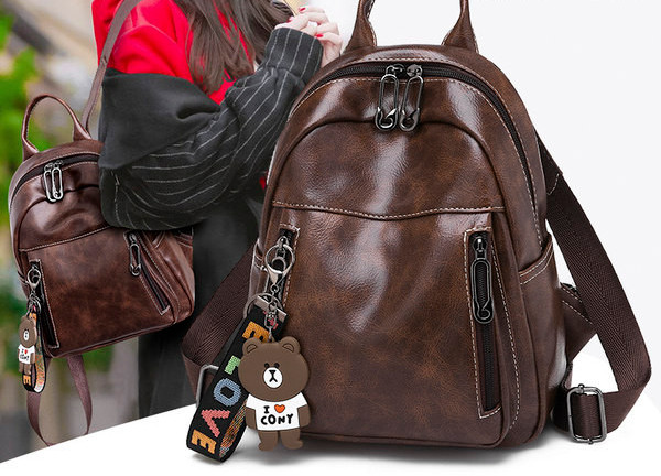 Női alkalmi bőr hátizsák fekete és barna zsebekkel