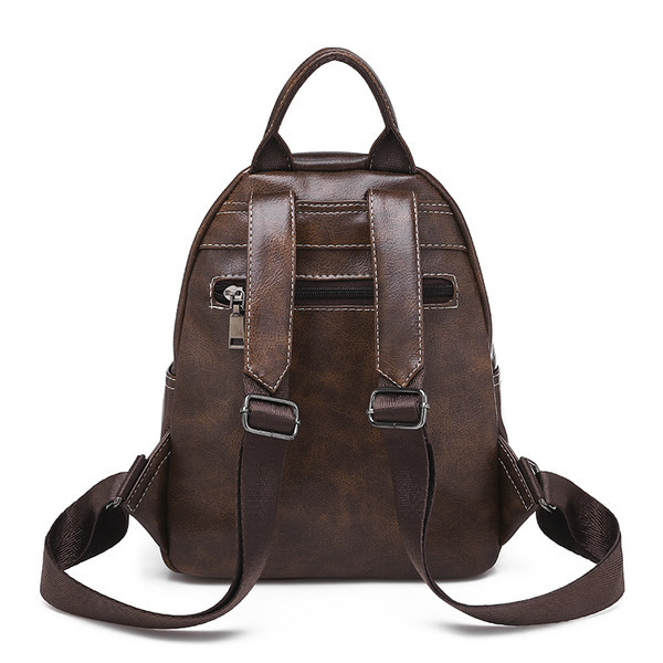 Női alkalmi bőr hátizsák fekete és barna zsebekkel