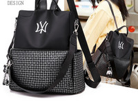 Tekstiilist tasku ja tikandiga seljakott - must ja punane