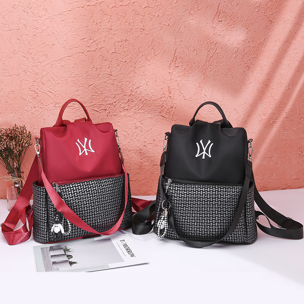 Tekstiilist tasku ja tikandiga seljakott - must ja punane