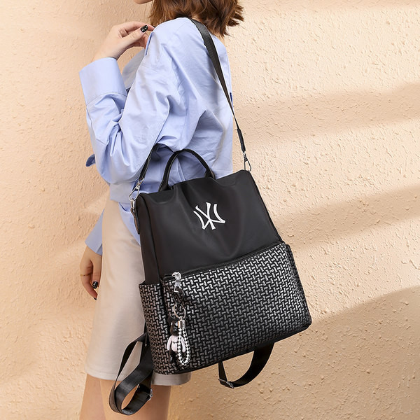 Tekstiilist tasku ja tikandiga seljakott - must ja punane