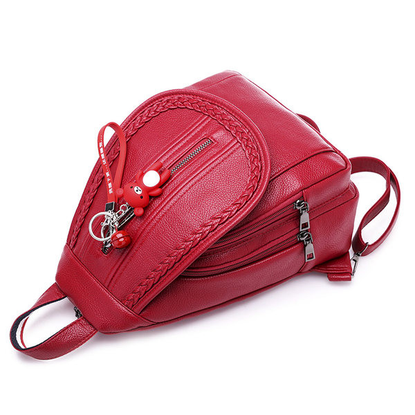 Naiste nahast seljakott luku ja ripatsiga