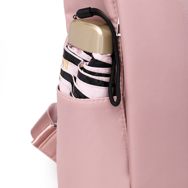 Naiste ühevärviline seljakott neljas värvitoonis udusulgedega