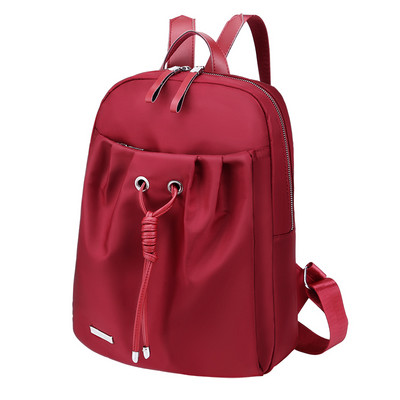 Kolmes värvitoonis esitaskuga naiste seljakott