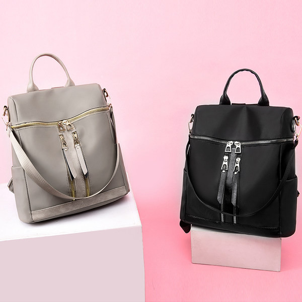 Naiste nahast seljakott eesmise lukuga - kahte värvi