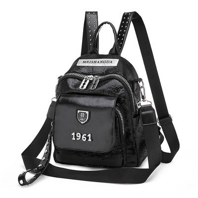 Μοντέρνο γυναικείο σακίδιο πλάτης με πούλιες και μεταλλικά στοιχεία