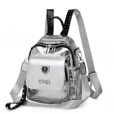 Μοντέρνο γυναικείο σακίδιο πλάτης με πούλιες και μεταλλικά στοιχεία