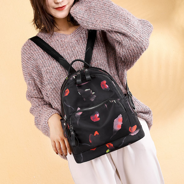 Igapäevane värvilise mustriga riidest seljakott