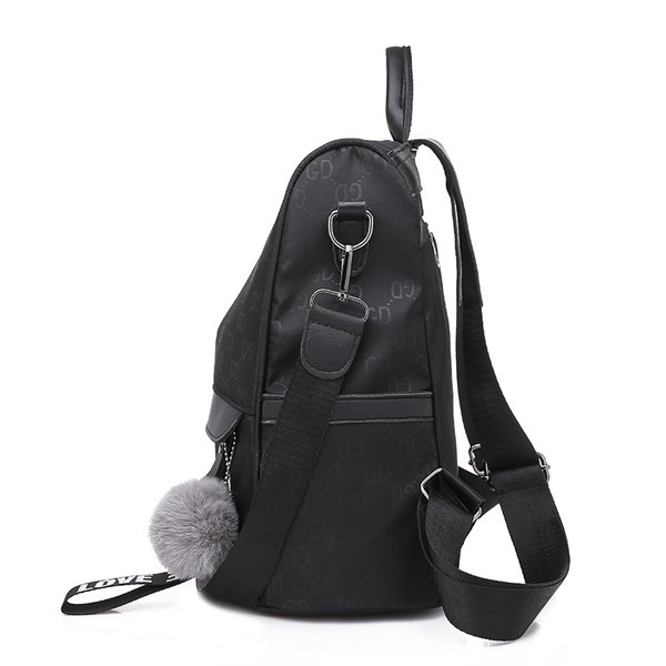 Must naiste seljakott esitasku ja sulekaunistusega