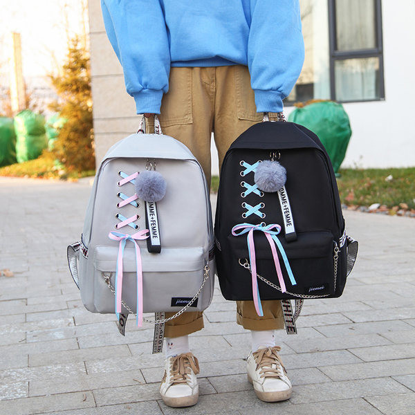 Naiste tekstiilist seljakott tasku ja värvilise ühendusega