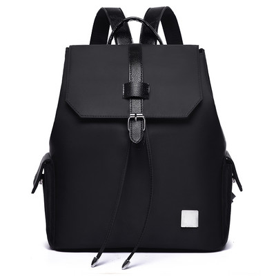 Γυναικεία τσάντα με πλαϊνές τσέπες σε τρία χρώματα