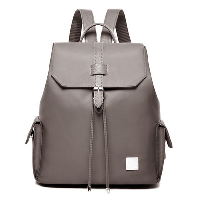 Γυναικεία τσάντα με πλαϊνές τσέπες σε τρία χρώματα