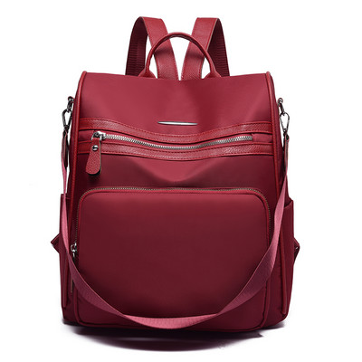 Praegune naiste tekstiilist seljakott luku ja taskuga