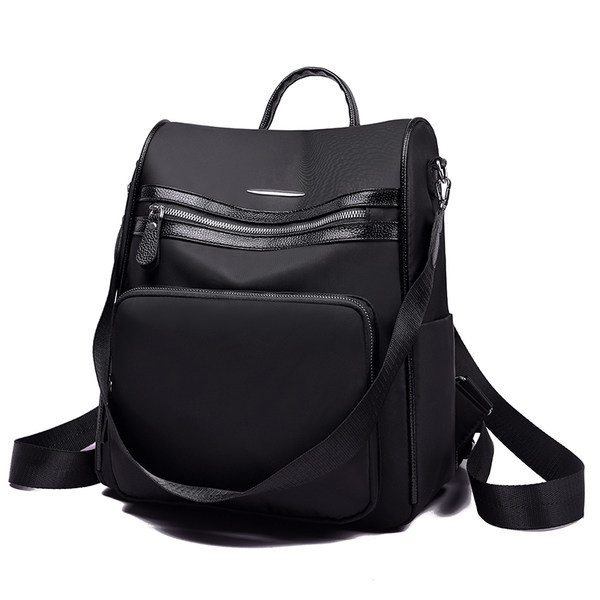 Praegune naiste tekstiilist seljakott luku ja taskuga