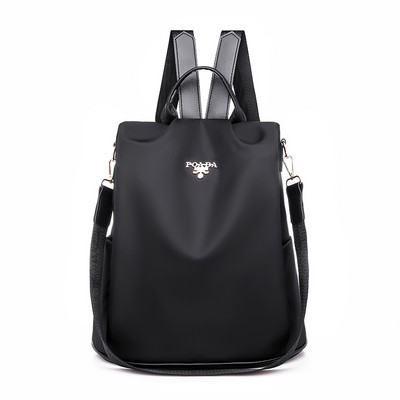 Női vászon hátizsák fém emblémával piros és fekete színben