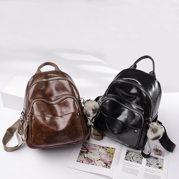 Naiste kunstnahast seljakott kahes värvitoonis