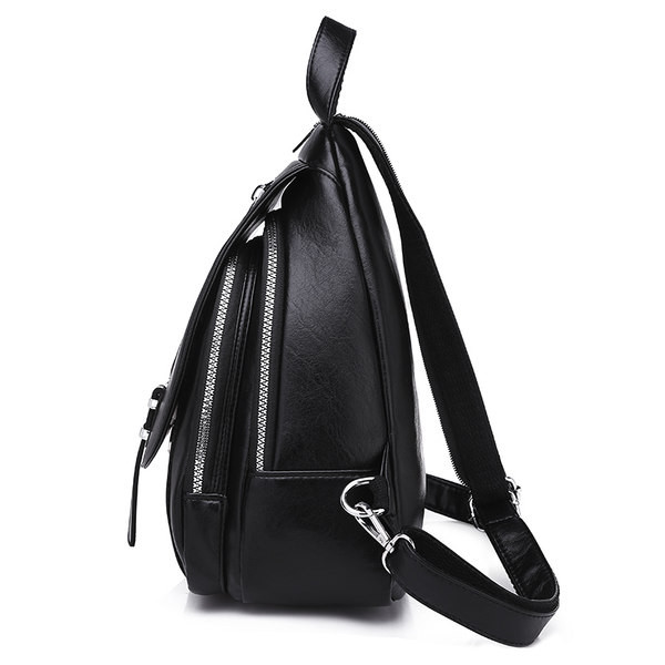 Kahes värvitoonis lukuga naiste nahast seljakott