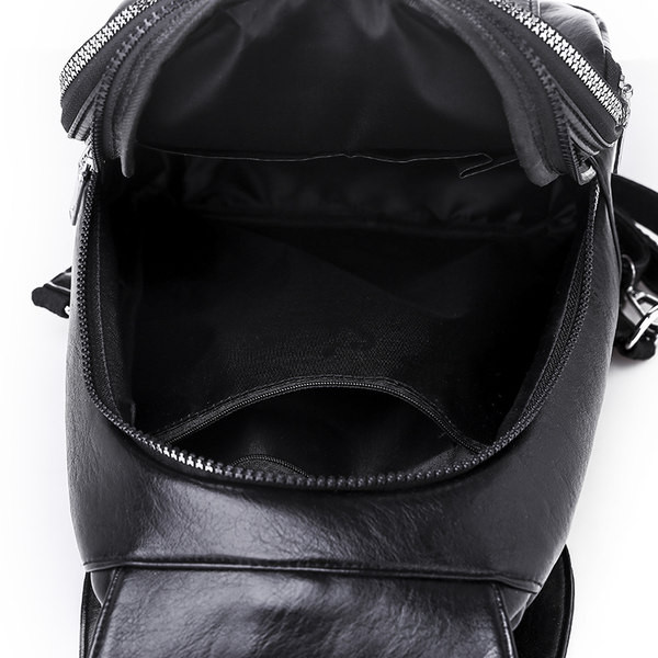 Kahes värvitoonis lukuga naiste nahast seljakott