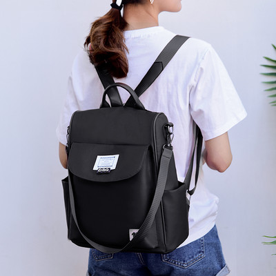 Mitmes värvitoonis tekstiilist sangaga naiste seljakott