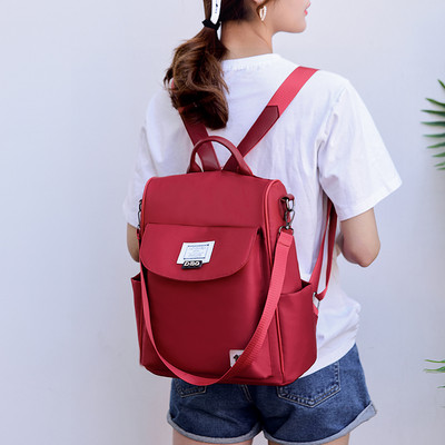 Mitmes värvitoonis tekstiilist sangaga naiste seljakott