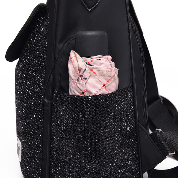 Mitmes värvitoonis tekstiilist sangaga naiste seljakott