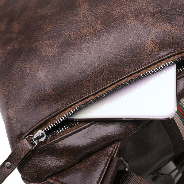 Väike ökonahast seljakott tekstiilosadega