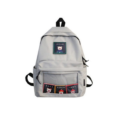 Naiste lõuendist seljakott embleemi ja esitaskuga