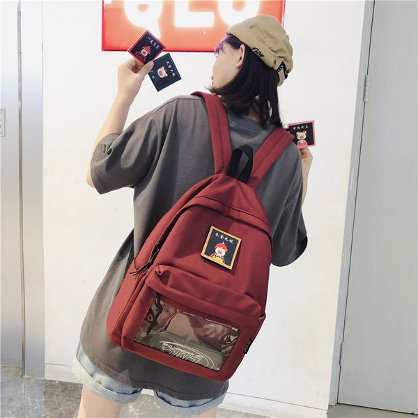 Naiste lõuendist seljakott embleemi ja esitaskuga