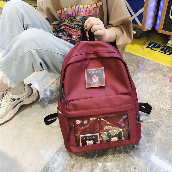 Naiste lõuendist seljakott embleemi ja esitaskuga