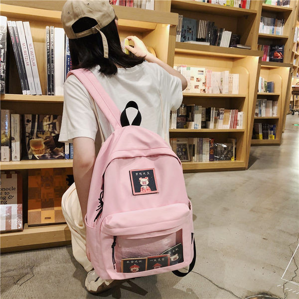 Naiste lõuendist seljakott embleemi ja esitaskuga